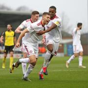 Dion Charles scored his seventh of the season as he grabbed the opener in the 1-1 draw at Burton Albion