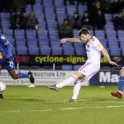 Bobby Grant blasts home Stanley's first goal in the 2-0 win at Shrewsbury Town Picture: KIPAX