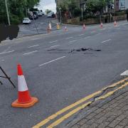Sinkhole, caused by a collapsed culvert, opens up on Manchester Road