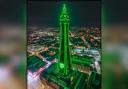 Blackpool Tower lit up in green