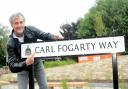 Carl Fogarty officially opens Carl Fogarty Way in Blackburn in 2019. Below, the former I'm a Celebrity champ pulls a pint of the Foggy Gold at his local boozer, The Spread Eagle in Mellor.