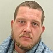 A man has been jailed after designer goods were stolen from a car in Preston.