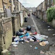 The rotting rubbish in the back alley behind Ribblesdale Street and Bar Street in the Bank Hall district of Burnley