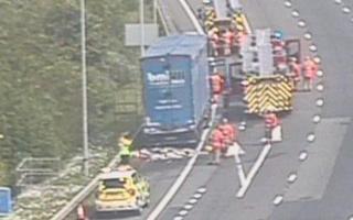 LIVE: M60 traffic stopped for fire close to Trafford Centre