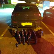 The car and 23 nitrous oxide bottles were seized