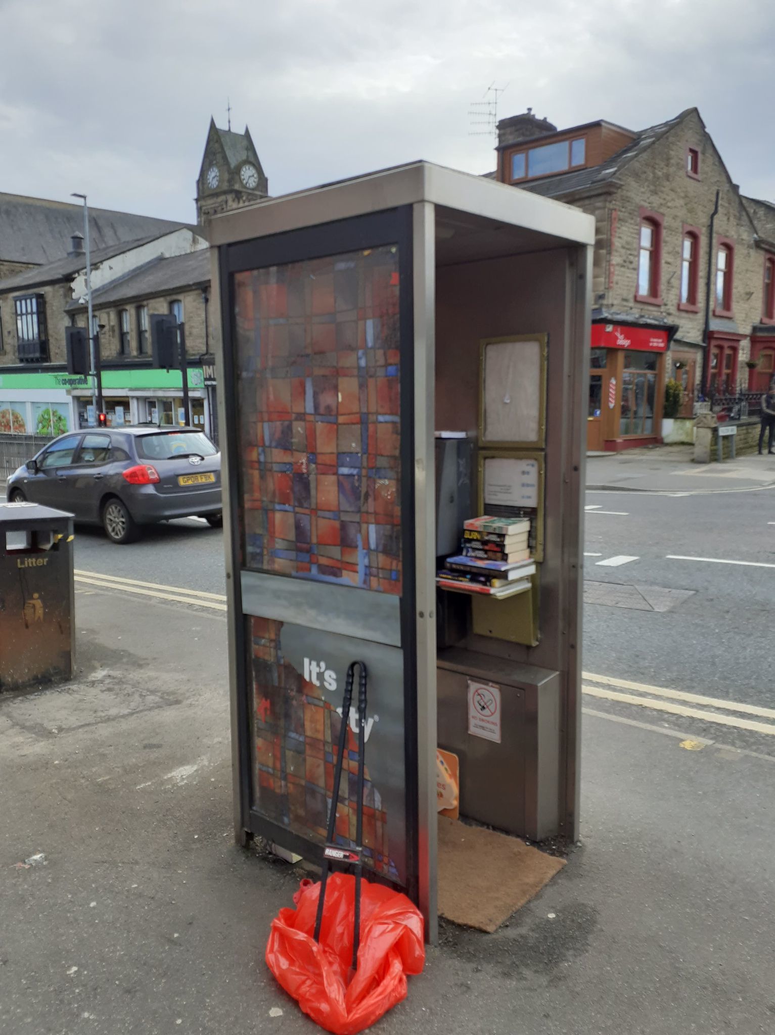 Wayne Dixon has transformed the old phone box in Darwen into a mini library