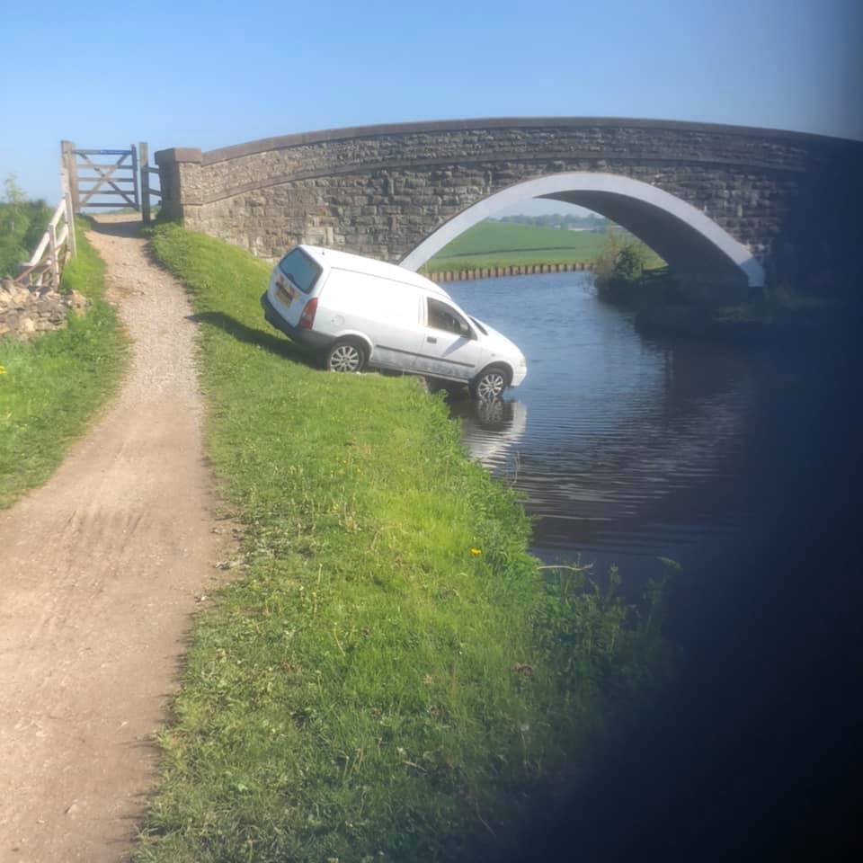Passers by say they have no idea how the car came to be in the lock