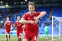 Sean McConville celebrates after putting Accrington Stanley into the lead at Prenton Park against Tranmere Rovers