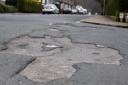 Action has been pledged to tackle potholes.