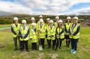 Students, teachers and construction staff at the new site for Whitworth Community High School
