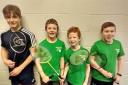 Junior badminton players in some of the first Rossendale Juniors t-shirts. L-R: Tom Phythian, Sam Bradshaw, Olly Bradshaw, Preston Willis