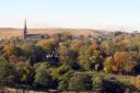 An autumnal view of Belmont village with the Parish Church in the background. By Roy Higson from Horwich