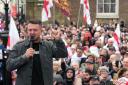 Tommy Robinson speaking during a St George’s Day event on Whitehall, in Westminster, central London (Jordan Pettitt/PA)