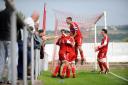 DELIGHT: AFC Darwen’s Paul Coote celebrates scoring his side’s second goal against AFC Liverpool