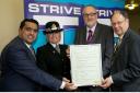 Tackling domestic violence are (from left) Cllr Tamoor Tariq, Inspector Karan Lee, Cllr Mike Connolly, and Jim Battle.. (40548617)