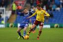 PHYSICAILITY: Burnley’s Chris Long comes under pressure from Cardiff’s Craig Noone in the 2-2 draw