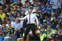 ENCOURAGEMENT: Dyche urges his side on at Stamford Bridge