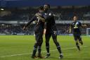 CRUCIAL STRIKE: Liam Feeney celebrates his goal against QPR with Rovers teammate Hope Akpan