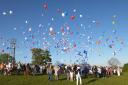 Hundreds gathered at Erskine Parish Church to let off a balloon in memory of Owen Macdonald