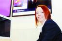 MUMMY IN THE BANK: Sarah Cooper  at her desk at Natwest