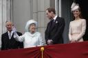 The Prince of Wales, the Queen and the Duke and Duchess of Cambridge on the palace balcony.