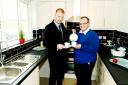 Pendle Council opened one of the houses newly renovated on Mosley Street, Nelson. Home improvement manager Matthew Pearson, left, is pictured with borough leader Coun Joe Cooney