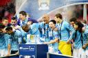 Manchester City celebrate their League Cup win