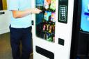 BREW TIME: Graham with one of his vending machines