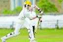 EASY DOES IT! Edenfield's James Leicester confidently deals with this delivery