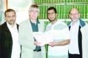 SIGNATURES: Coun Naeem Ashraf and Coun Mohammed Iqbal, along with Brierfield community activist Robert Allen, present petition to MP Gordon Prentice