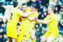 RY-AN MIGHTY: The Stanley players mob goalscorer Jimmy Ryan after scoring the opener at Bradford