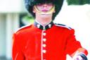 HATS OFF?: Burnley Irish Guard Martyn Walters on parade in a bearskin