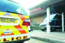 FLASHBACK: Police at the scene of the Tesco store raid in Blackburn