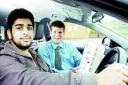 LEARNING CURVE: Bilal Hussain, 17, with driving instructor Steve Rhodes