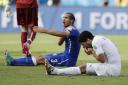 Suarez bite overshadows Uruguay's win over Italy