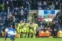 SINKING FEELING: Reading players celebrate George Evans’ late winner at Ewood Park on Saturday