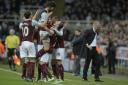 COMEBACK: Burnley’s players celebrate George Boyd’s late equaliser in the stunning 3-3 draw with Newcastle