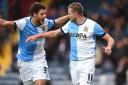 Blackburn Rovers star Jordan Rhodes celebrates his second goal against Charlton Athletic at Ewood Park, with Rudy Gestede