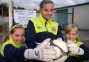 HANDS ON: Jazz Elliott, centre, with her sisters Jade and Justine at Rovers’ centre of excellence