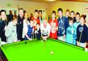 FAN BASE: Steve with the youngsters who enjoyed the snooker scheme at Whalley Village Hall