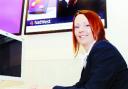 MUMMY IN THE BANK: Sarah Cooper  at her desk at Natwest