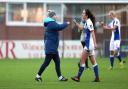 Manager Gemma Donnelly and midfielder Tash Fenton at the final whistle against Liverpool. Credit: KIPAX