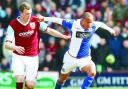 SWEDE DREAMS: Martin Olsson takes on Burnley’s Kevin McDonald