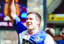 NUMBER ONE: David Dunn salutes the travelling Blackburn supporters