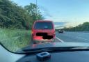 Driver wanted for seven offences by neighbouring police force arrested on motorway