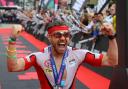Blackburn’s Brian Fogarty celebrates after winning the Ironman UK in Bolton two years ago