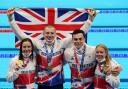 Great Britain's Kathleen Dawson, Adam Peaty, James Guy, and Anna Hopkin with their Gold medals for the Mixed 4 x 100m medley relay at Tokyo Aquatics Centre on the eighth day of the Tokyo 2020 Olympic Games in Japan.