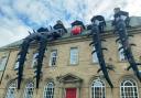 The Colne building has been invaded by a giant spider (Facebook/@thebestcardeals )