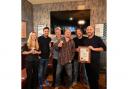 The new batch of brewers at Thwaites, receiving the award from CAMRA, with head brewer Mark O'Sullivan, far right
