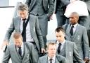 A RATHER dejected England squad arrived back in the country yesterday morning still reeling from their World Cup exit. England landed at Heathrow at 6.20am.